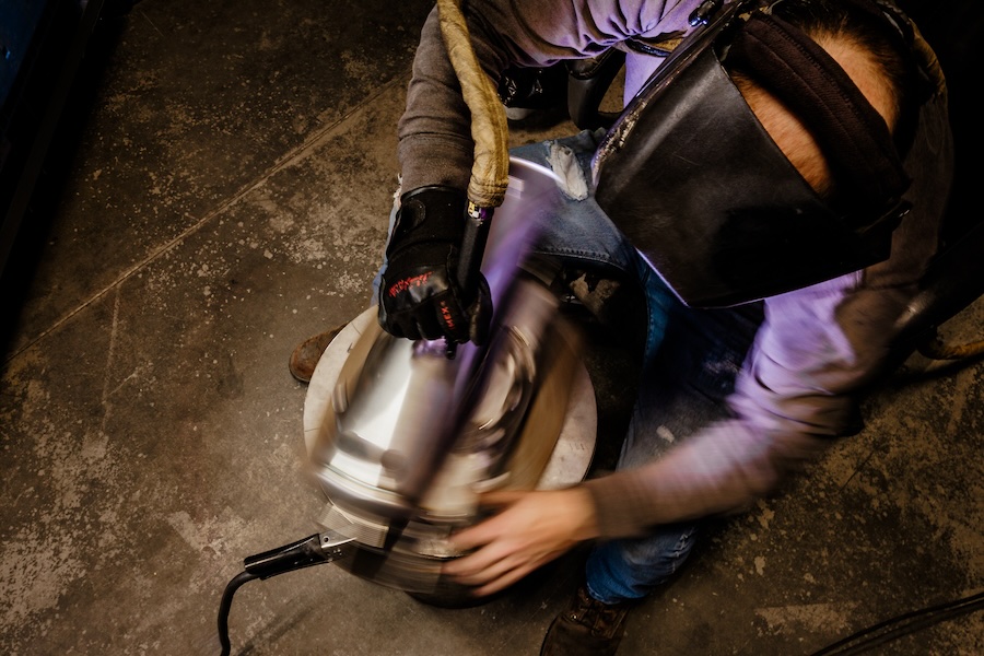 Overview photo of a welder making a custom tank.